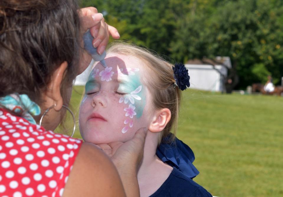 FAMILY ENTERTAINMENT Family Days before the Grand Prix each Sunday featured lots of activities for the whole family including face painters, balloon artists, bounce houses, horseless horse shows and