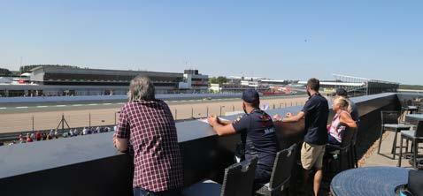 views of the pit lane and the start/finish line excitement Beer & Wine Bar Daily