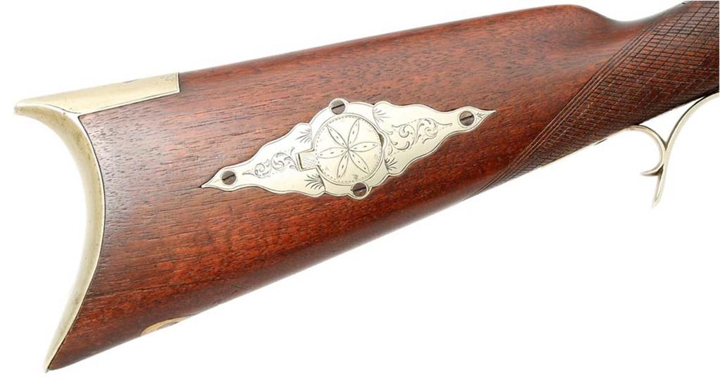 The rifle is a classic mid-1850s half-stock plains style percussion rifle, although the barrel is slightly longer than typical for these arms, and the gun is of the highest trim level or grade