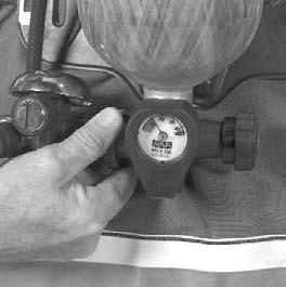 REMOVING THE AIR MASK 5. Stow the regulator in the STAND-BY belt mount when it is not in use. 6.