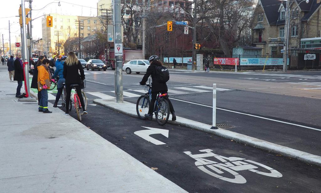 Adelaide Street North Side Option Bathurst-Adelaide Intersection A new cyclist storage layby was constructed at Bathurst St and Adelaide St W in Fall 2017 If the switch of