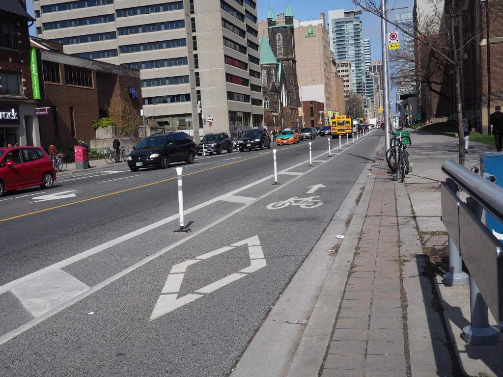 Richmond St, the City may consider options such as a raised platform and cycle