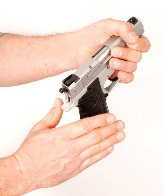 ASSUMING A TWO-HANDED GRIP SLIDE II-15 NON-SHOOTING