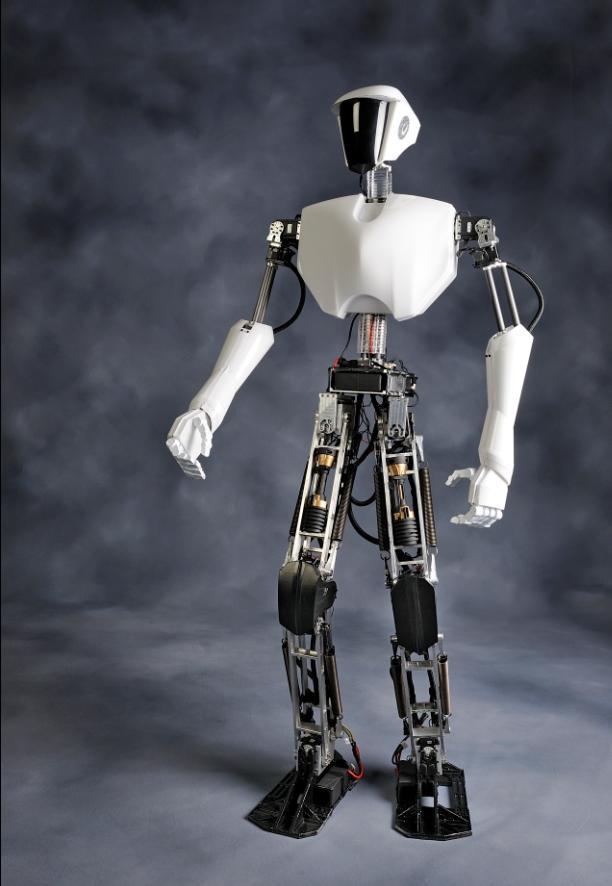 Figure 2. Spring Assisted Parallel Four-bar Linkage with Synchronized Actuation Figure 1. Humanoid robot CHARLI-L and Thomas Buschmann et. al.