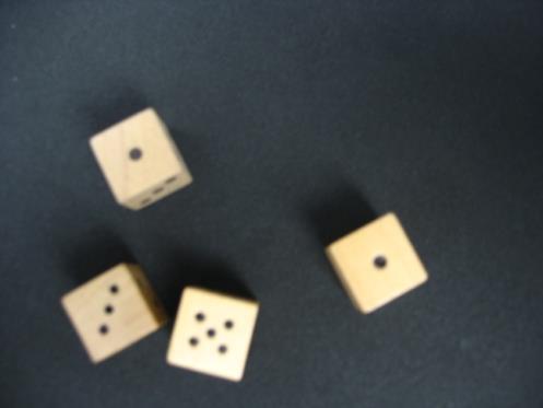 Wood Dice Although many colonial Virginians may have considered dice too closely associated with gambling to be used