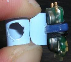 Figure 7 An example mounting arrangement for a smaller logger using 0.75mm thickness Darvic, cable tie and self amalgamating tape.