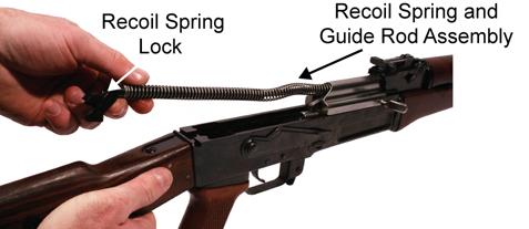 TM 8370-50007-OR/1 0015 00 5. Remove the recoil spring and guide rod assembly by pushing forward on the recoil spring lock until it clears the lock recess in the rear of the receiver.