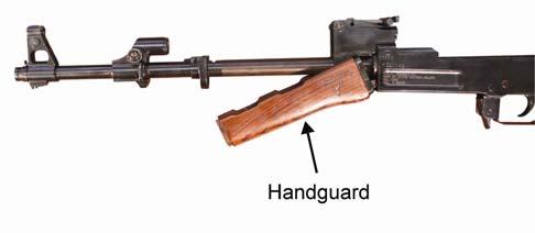 TM 8370-50007-OR/1 0015 00 9. To remove the handguard, swing the locking lever forward. Refer to Figure 12.