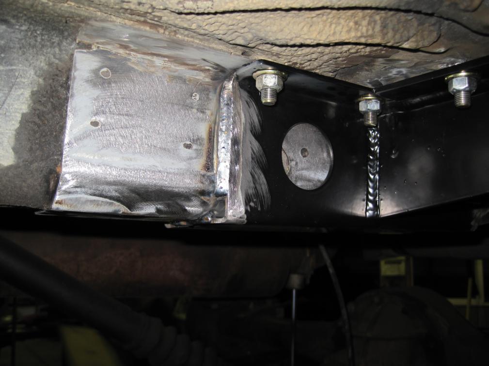 10) Paint any areas of bare metal exposed, secure fuel and brake lines