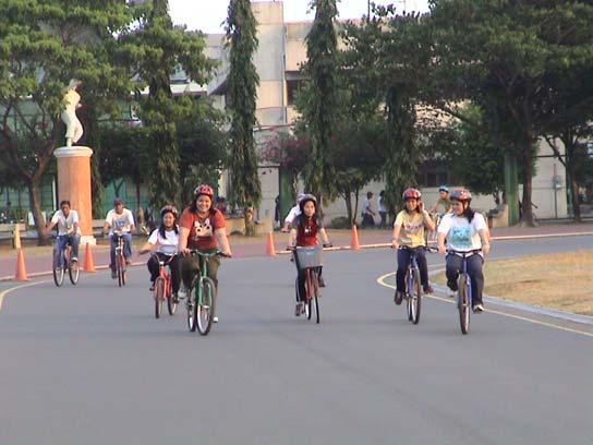 Women on Bike... ( Friday Night at the Oval) OPTING FOR THE EASY AND HEALTHY WAY OF LIFE.
