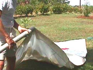 Ê 5. Insert mast base into mainsail With the mainsail completely extended,