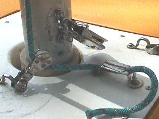 16. Secure the halyard Making sure that the halyard does not wrap the mast--