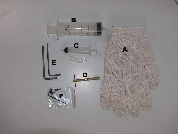 7 Identification of Accessories. A. Protective gloves B. Boiler filling syringe C. Small syringe with tubing for lubricator D. Special tool for the steam regulator when it gets hot! E.