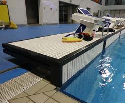 The SwimWall is positioned securely flat on the pool floor when not in use.
