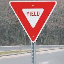Tasks On Suburban Roads: Yielding What is a yield? It does not mean to stop necessarily.