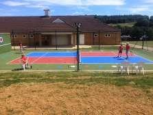 months and now boasts eight fully floodlit courts, four being artificial clay, two