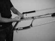 Pulling in on the strap or line (reducing the length) causes the kite s power to