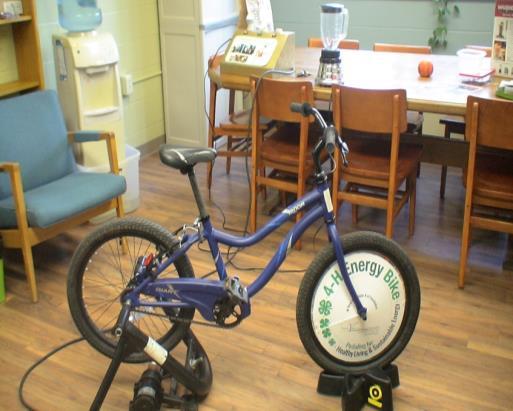 4-H Pedal Power Energy Bike Set up Instructions 1. On the bike stand, pull legs to the open position.