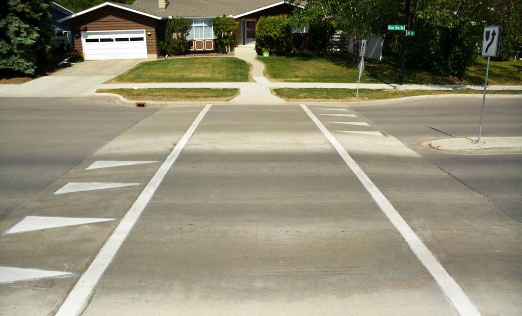 Proposed Traffic Calming Measures RAISED CROSSWALKS Slows vehicle traffic through the crosswalk Improves awareness of the pedestrian crossing Eases access