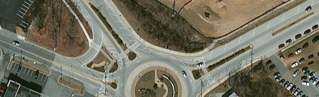 Modifications were made to address path overlap and resign and restripe the roundabout to single-lane
