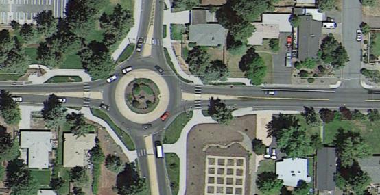 1. Via Google Earth zoom or search to the roundabout site of interest. 2. Count the number of lanes circulating around the central island; lanes are often separated by dashed or solid lines. 3.