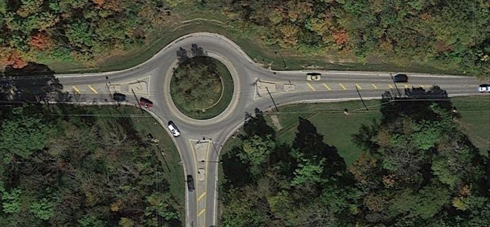 Figure B2-6 Number of Entering Lanes for a Roundabout with Three Legs N Image Source: Google Earth, 2014. The number of entering lanes per leg does not include right-turn bypass lanes on the leg.