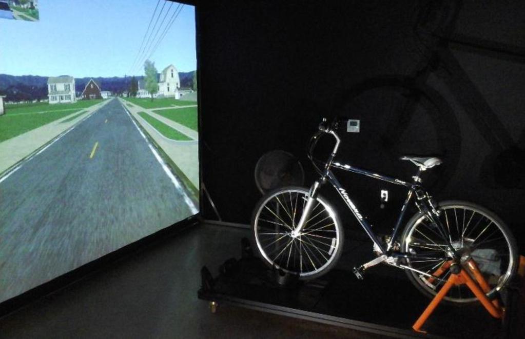 2 Transportation Research Record 00(0) Figure 1. Calibrated Oregon State bicycle simulator. speed to emulate the performance of a bicycle.