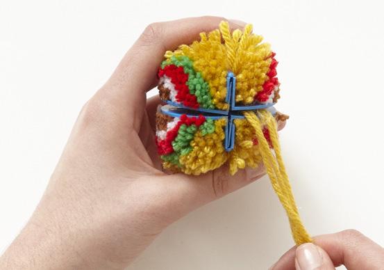 How to Join Pompoms Together Joining pompoms together allows you to trim them into interesting