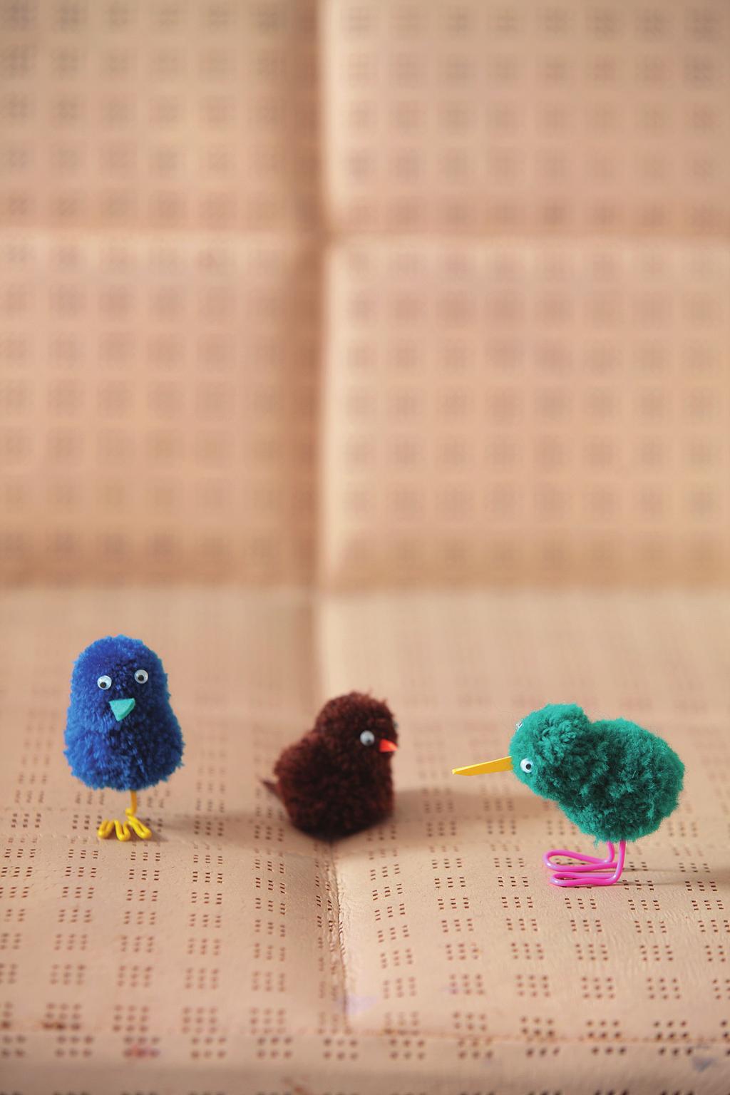 Birds Head Body Make the same two pompoms using the smaller pompom maker, and join them (see joining instructions). Trim the head smaller than the body. Add eyes, beak, and legs as below.