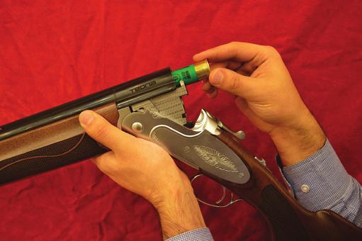 (Moved to rear, S exposed) Install suitable cartridges according to your shotgun s gauge and chamber length. STEP 3: Close your shotgun.