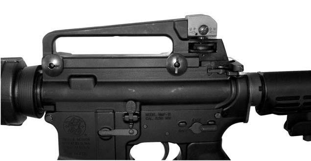 CARRY HANDLE WHEN EQUIPPED FOR OPTICS INSTALLATION Loosen both screws on the side of the carry