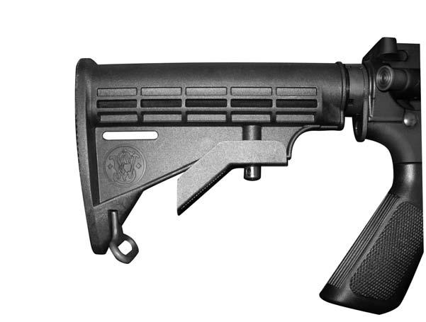 FIGURE 37 COLLAPSIBLE STOCK WHEN EQUIPPED To extend the collapsible stock, depress lever and pull