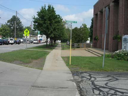 The sidewalk connects with pedestrian facilities throughout Chardon Square, which