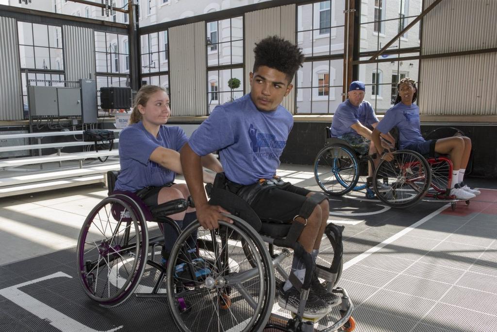 Miles Hill and Lizzie Becker would share that wheelchair basketball is what gave them the push to strive and earn scholarships to play wheelchair basketball at the University of the Illinois and the