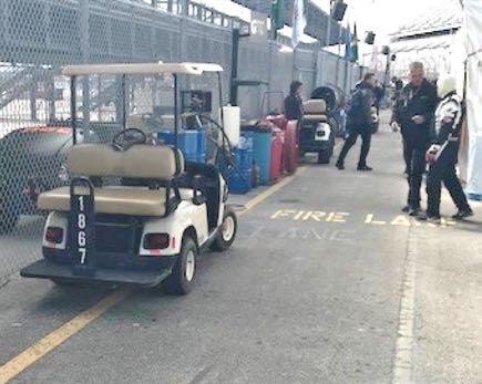 Pit Lane Fire Lane: NOT ACCEPTABLE NOT ACCEPTABLE BY ORDER OF FIRE MARSHAL CARTS/TUGGERS MUST