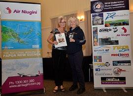 Compact Macro 1st Place Libby Sterling Libbby accepting her prize of a 10 day diving trip at Club