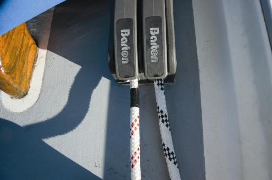 Lower the main halyard to the correct position for reefing and reef mainsail. If correct, mark the halyard at the position of the cleat with permanent marker. 12.