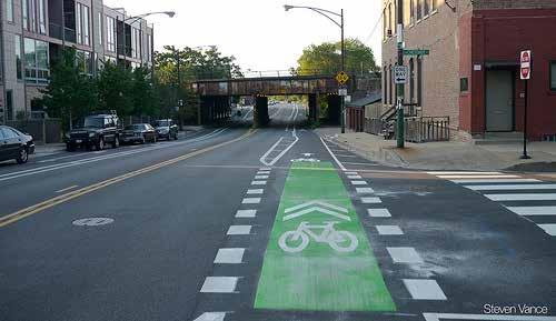Lane Markings: Use dotted/dashed lines to indicate areas of bicycle/vehicle conflict, such as bicycle lane markings continuing through intersections or where right turning lanes cross bicycle lanes.