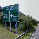 Follow the A420 for approximately two miles until you get to