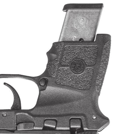 Make sure your finger is off the trigger and out of the trigger guard. Depress the magazine release and remove the magazine (FIGURE 15).