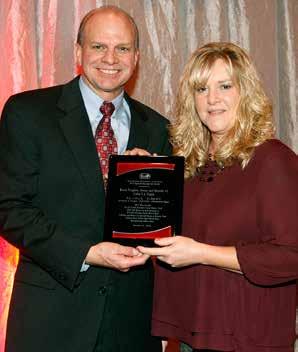 Kevin Greenfield presents Jennifer Brown on behalf of Bruce Trogdonbreeder and owner of Color s A Virgin, with an OHHA Special Award at the OHHA Annual Banquet. Photo by Conrad Photo.