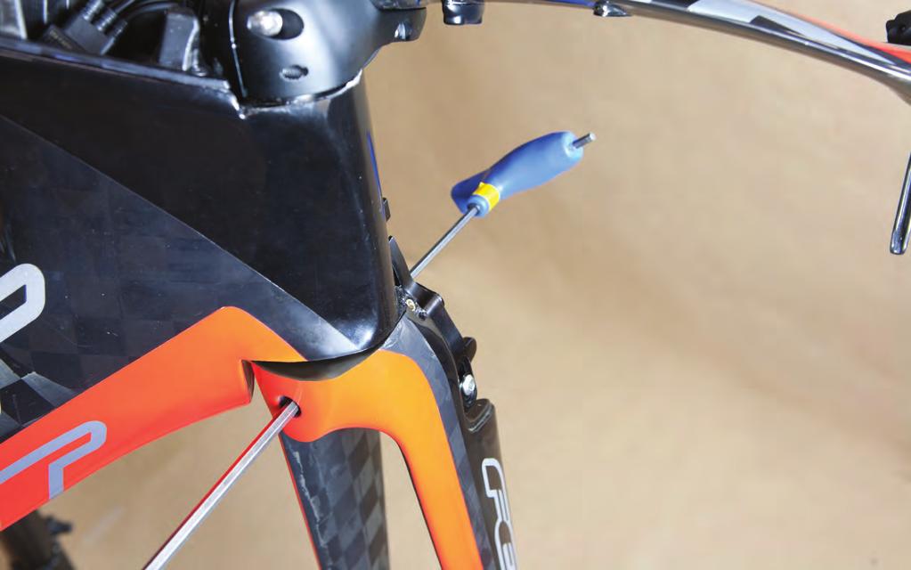 Step 2 Tighten Brake Bolts Using a 4mm and 5mm Hex Wrench,