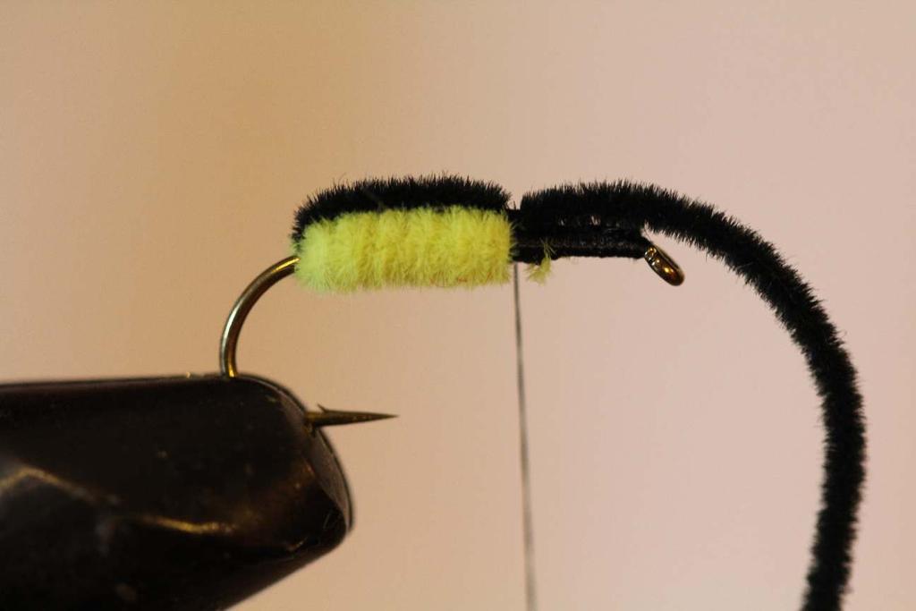down, and trim. 5. Pull black chenille over-top of the chartreuse chenille, and tie down with a couple turns. 6.