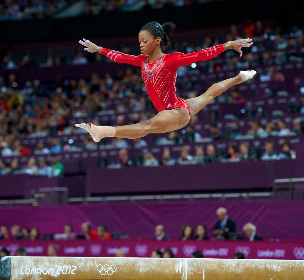 REAL SPORTS Most Important Moments in Sports 2011 2012 Page 23 14 Photo Courtesy: USA Gymnastics John Cheng Gabby Douglas skies high while performing her balance beam routine.