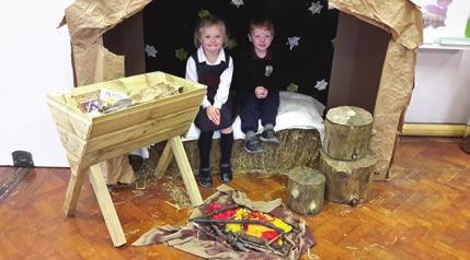 Triska showed them how to balance the twigs together to build a little shelter.