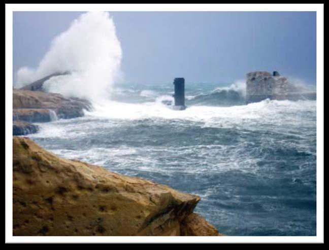 for wind driven waves to be higher than 12m, with boulders up to 15 tons weight being washed over sea walls