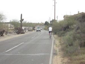 No bike lane striping, signage, or pavement markings exist. The project area falls within the jurisdiction of both the Town of Cave Creek and the Town of Carefree.