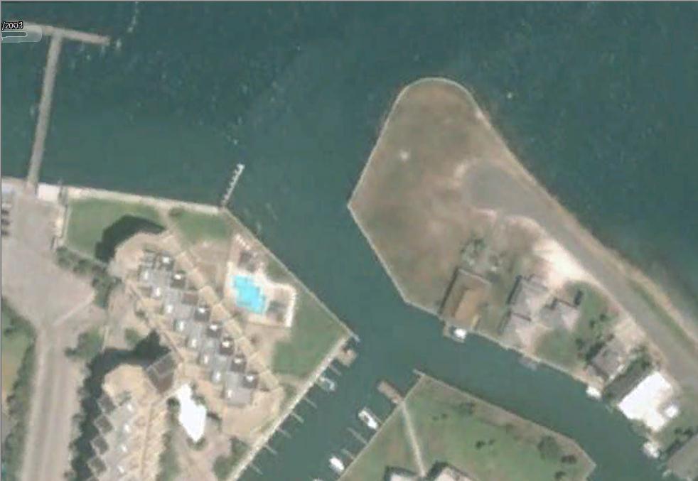 Figure D5. Aerial photograph of the project site in 1993 (breakwater length ~ 80 ft). Figure D6.