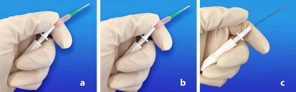 8. Gently detach the catheter from the handle using the thumb and forefinger of one hand as shown below, while the other hand supports the animal to maintain the catheter s position in the trachea. 9.