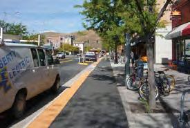 A bike box is a pavement marking to indicate location for bicyclists to wait at an intersection in front of vehicles.